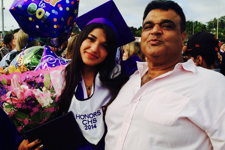 Becoming a Doctor: Yoselin Moetamedi Garcia and her father at her high school graduation