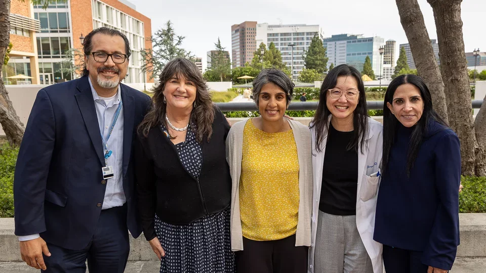 A group of faculty and staff at the Gold Humanism Honors Society induction ceremony
