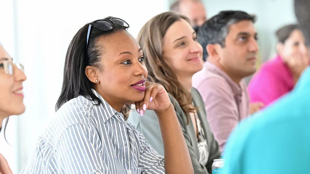 Staff members watching a Cultural North Star presentation