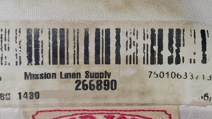 Worn out barcodes are illegible to our laundering company and must be retaped.