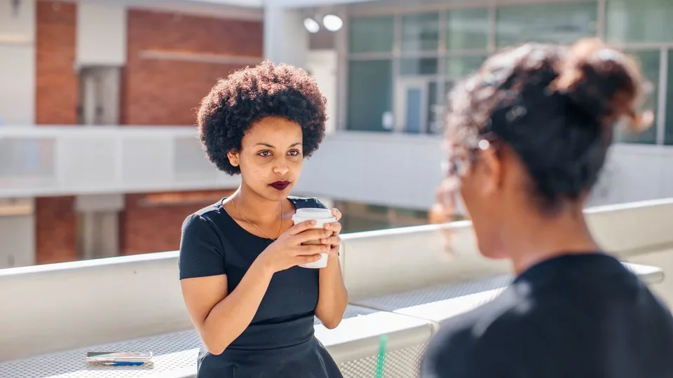 Students talking in courtyard