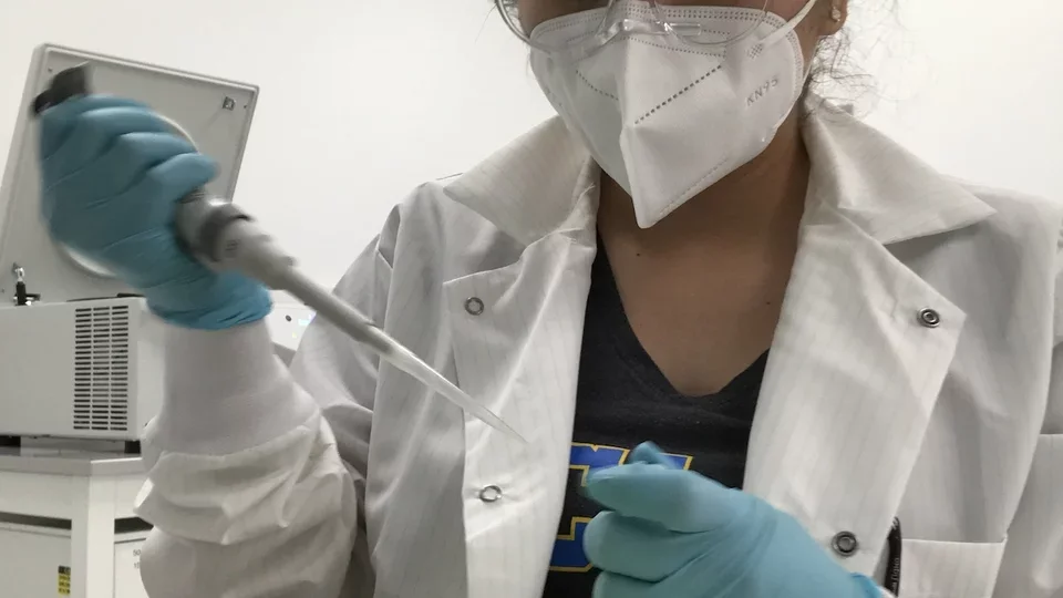 Liliana Perez, pictured completing COVID-19 sequencing, shares why she's becoming a doctor