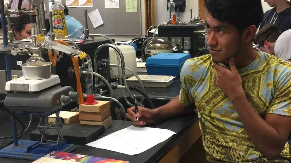Faustino Gonzalez Barrales in a classroom lab on his way to becoming a doctor