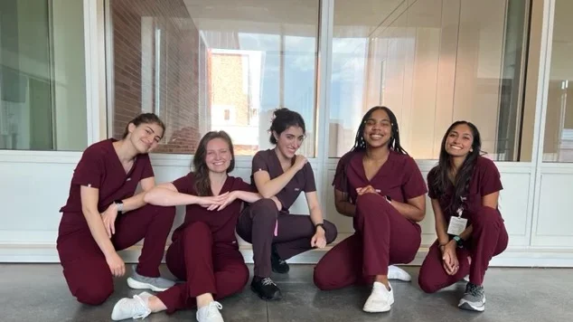 Medical students in their hospital scrubs