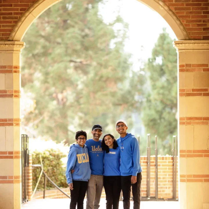 The Agarwal family poses in a UCLA academic building