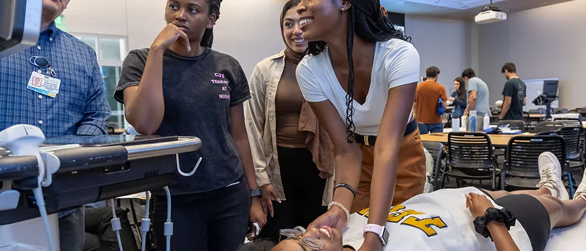 Students try techniques during POCUS week in the learning studio