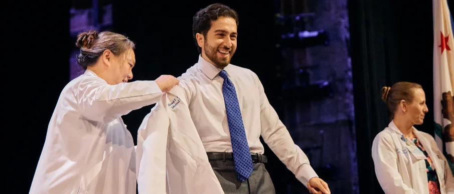 Incoming DGSOM class of 2030 medical students celebrate the White Coat Ceremony.