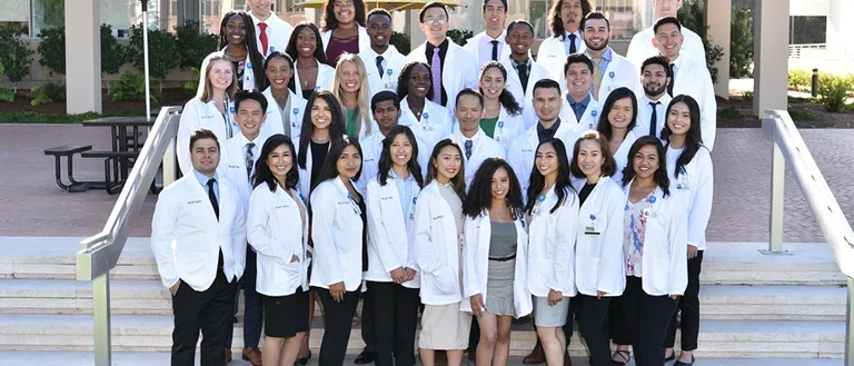 Group of pre-med students in white coats