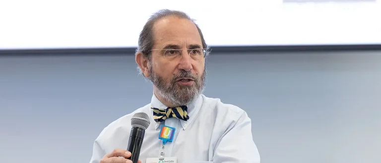 Dr Madrenas  presenting information with enthusiasm and professionalism.