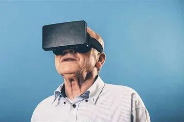 A man wearing a virtual reality (VR) headset. 