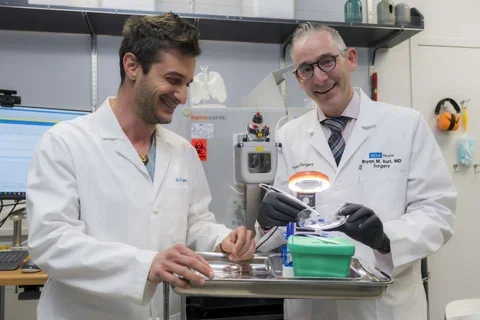 Dr. Bryan Burt, right, pictured with research scientist Dr. Alberto Antonicelli. 