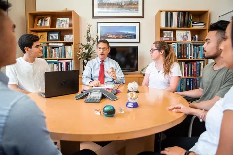 Dr. Donald Kohn meeting with students | Photo by Ann Johansson