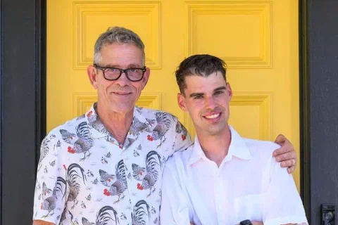Joe Henry and his son, Franklin, who has a rare genetic mutation
