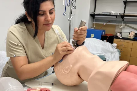 Liliana Perez, pictured with a medical model, shares why she's becoming a doctor