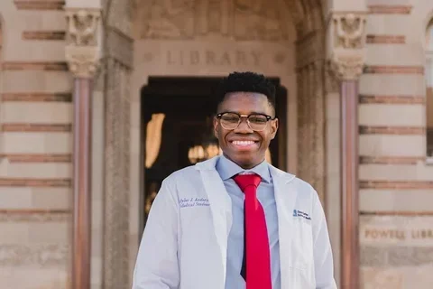 Medical students Myles Anderson, pictured in front of the UCLA library, shares why he's becoming a doctor