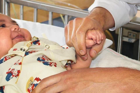 Interested in Becoming a Pediatrician? Doctor and Infant Patient