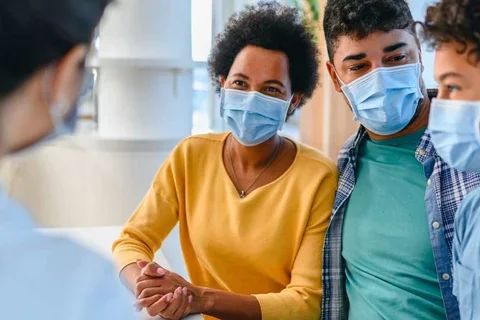 Family wearing masks