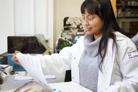 Photo of female medical student working in a lab 