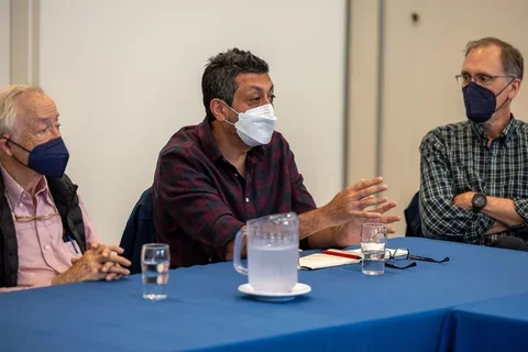 Profs Grinnell Khakh and O'Dell in meeting