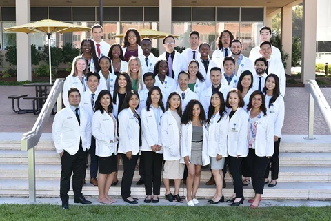 Group of pre-med students in white coats