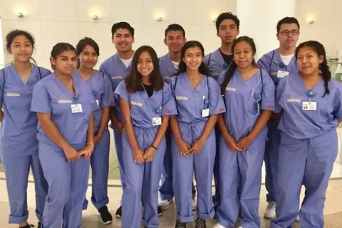 student interns hanging in a group