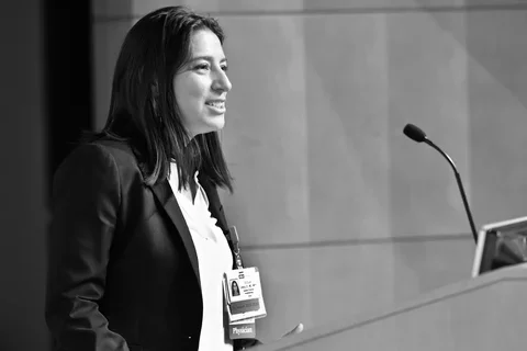 UCLA's Dr. Cecilia Canales, pictured speaking at an anesthesiology conference, shares her expertise about anesthesia side effects.  