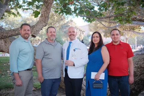 Medical student Alexander Dymond, pictured here with his family, shares his story of becoming a doctor