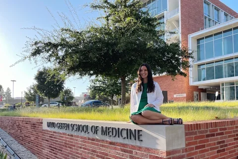 Medical student Shannon Richardson, pictured here in front of Geffen Hall, shares her story of becoming a doctor.