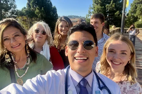 DGSOM medical student Jose Segura-Bermudez posing with friends and family