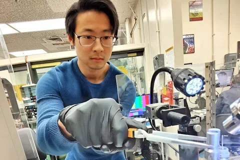 Justin Pi, pictured here working in a lab setting, shares his experience of getting a PhD at UCLA