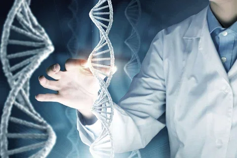 A physician with a graphical representation of DNA 