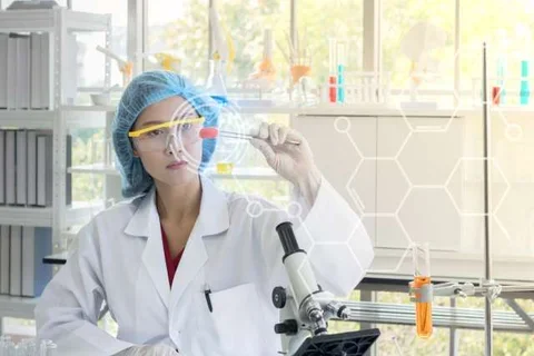 Researcher holding test tube