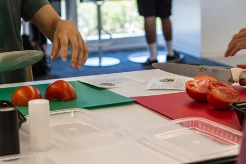 A sports nutritionist running a food demonstration 