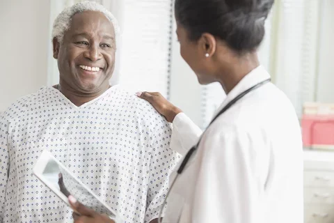 What is a urologist? Female urologist pictured with her patient