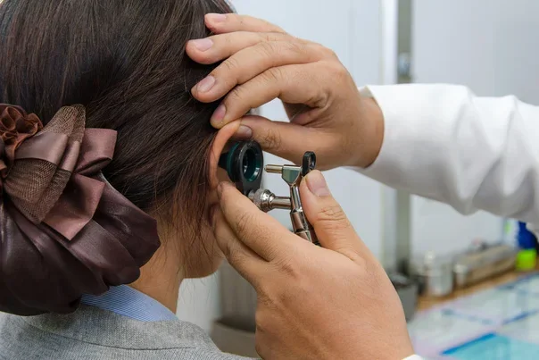 Specialty Spotlight Otolaryngology (ENT) Event Image Doctor Examining Women's Ear