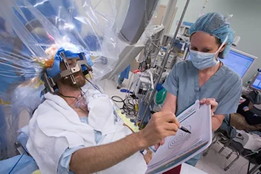 A patient undergoing deep brain stimulation 