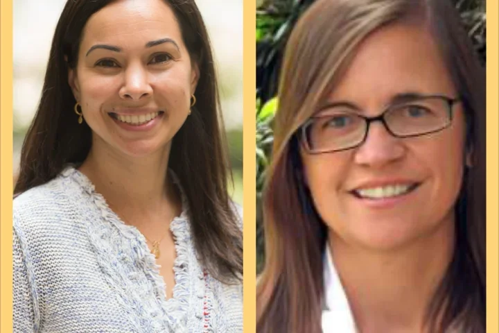 two women in professional attire