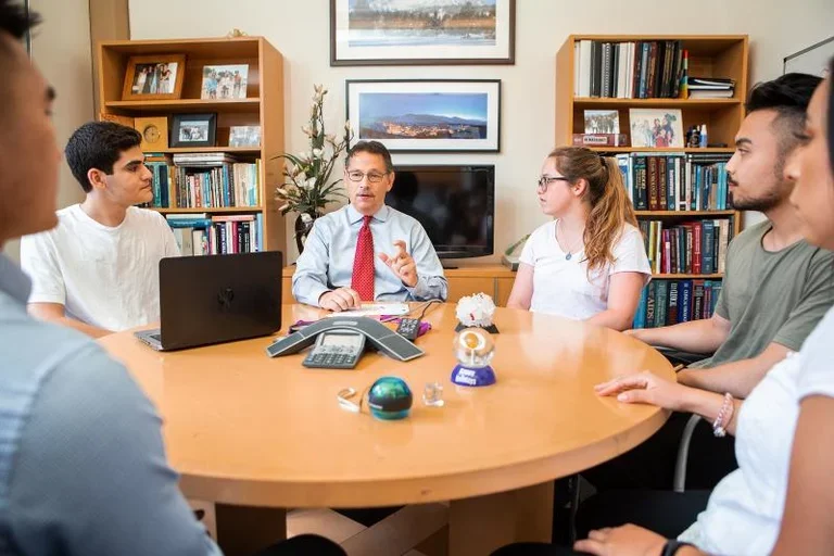 Dr. Donald Kohn meeting with students | Photo by Ann Johansson