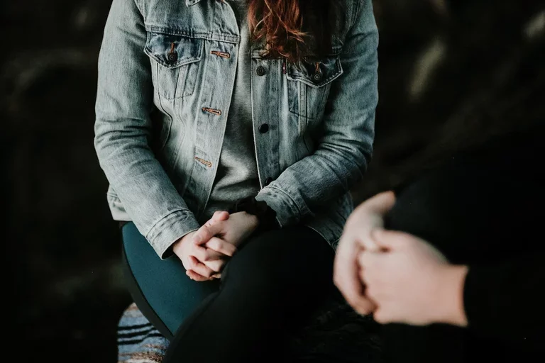 Two people during a therapy session