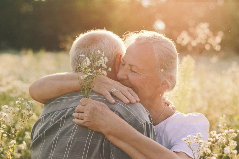 caucasian couple hugging