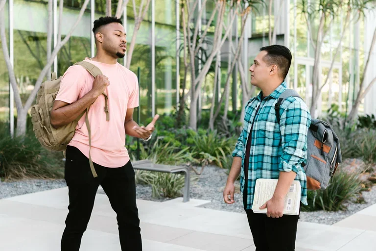2 students speaking 