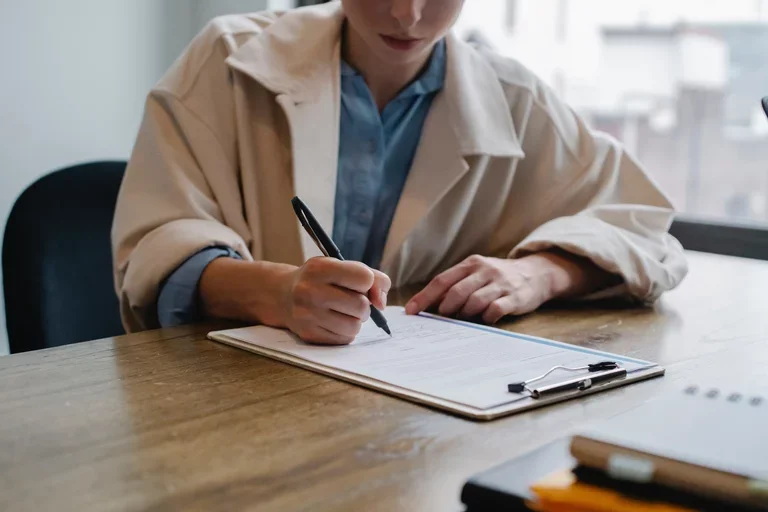 Woman filling out form