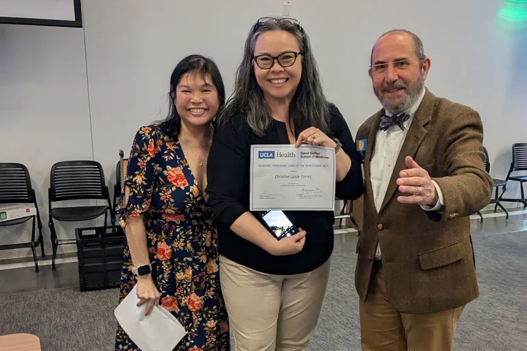 Arlene Feliciano, Christine Lazok-Torres, and Joaquín (Quim) Madrenas, , MD, PhD, at award ceremony