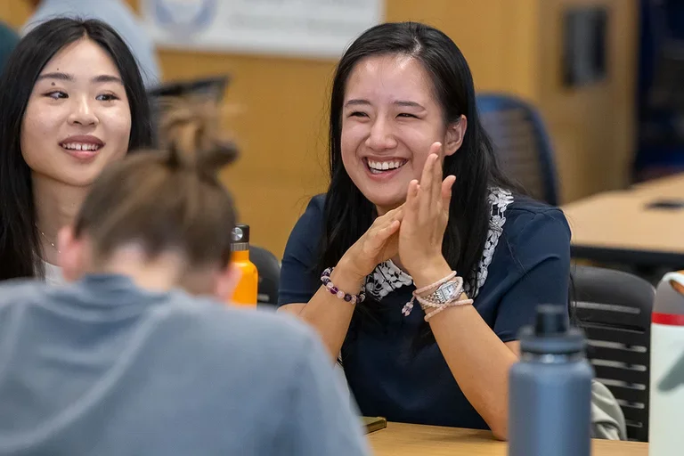Student Laughing with Others