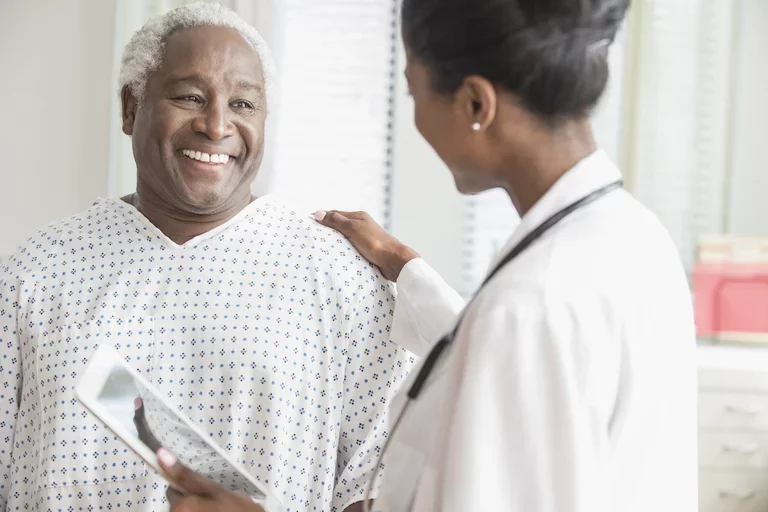 What is a urologist? Female urologist pictured with her patient
