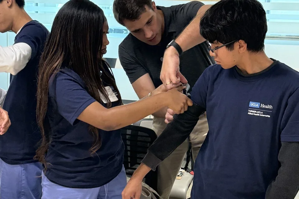 Medical students practice techniques during a learning exercise