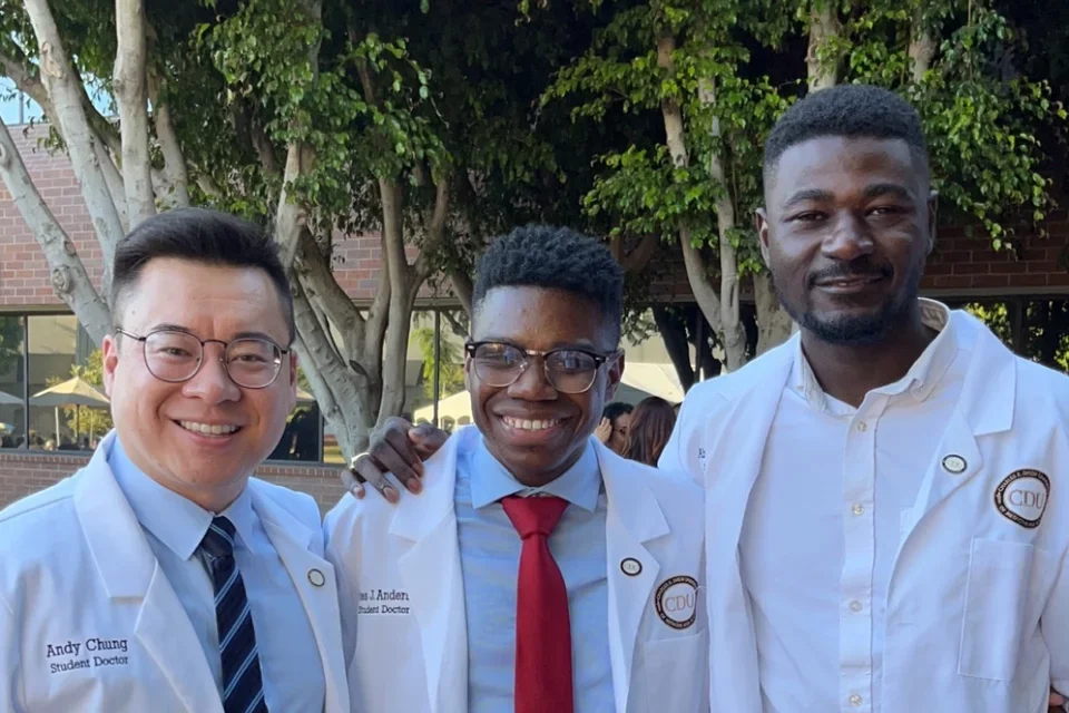 Medical students smiling for a photograph