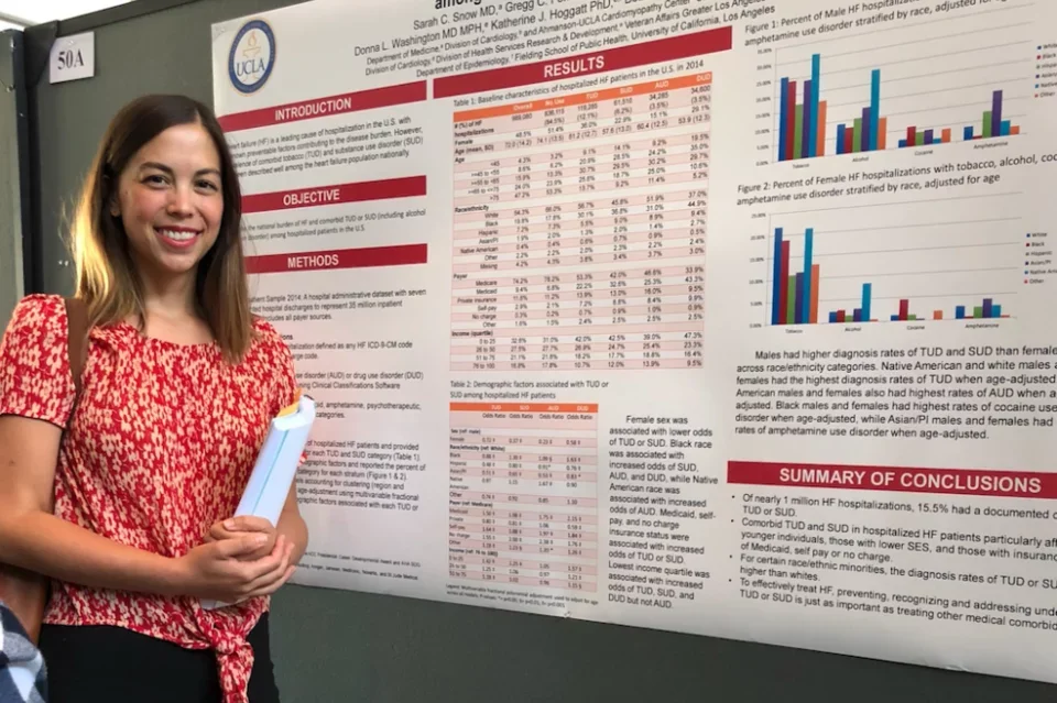 Sara Snow with her research poster at the GIM Department of Medicine Research Day