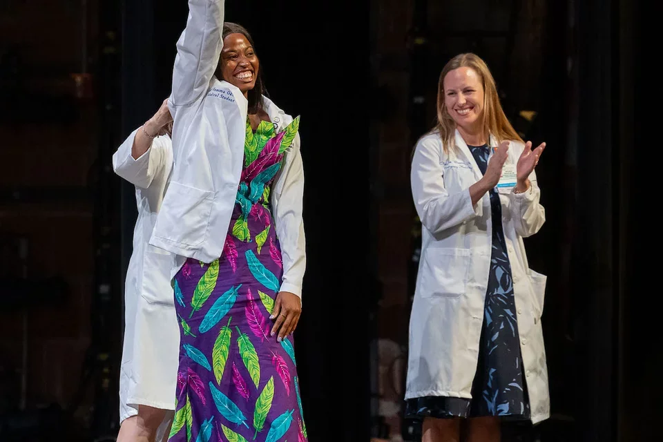 Dr. Natasha Wheaton and a student at the White Coat Ceremony