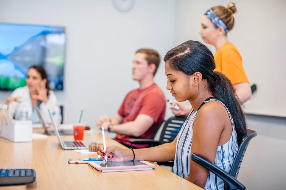 Medical student using tablet in classroom